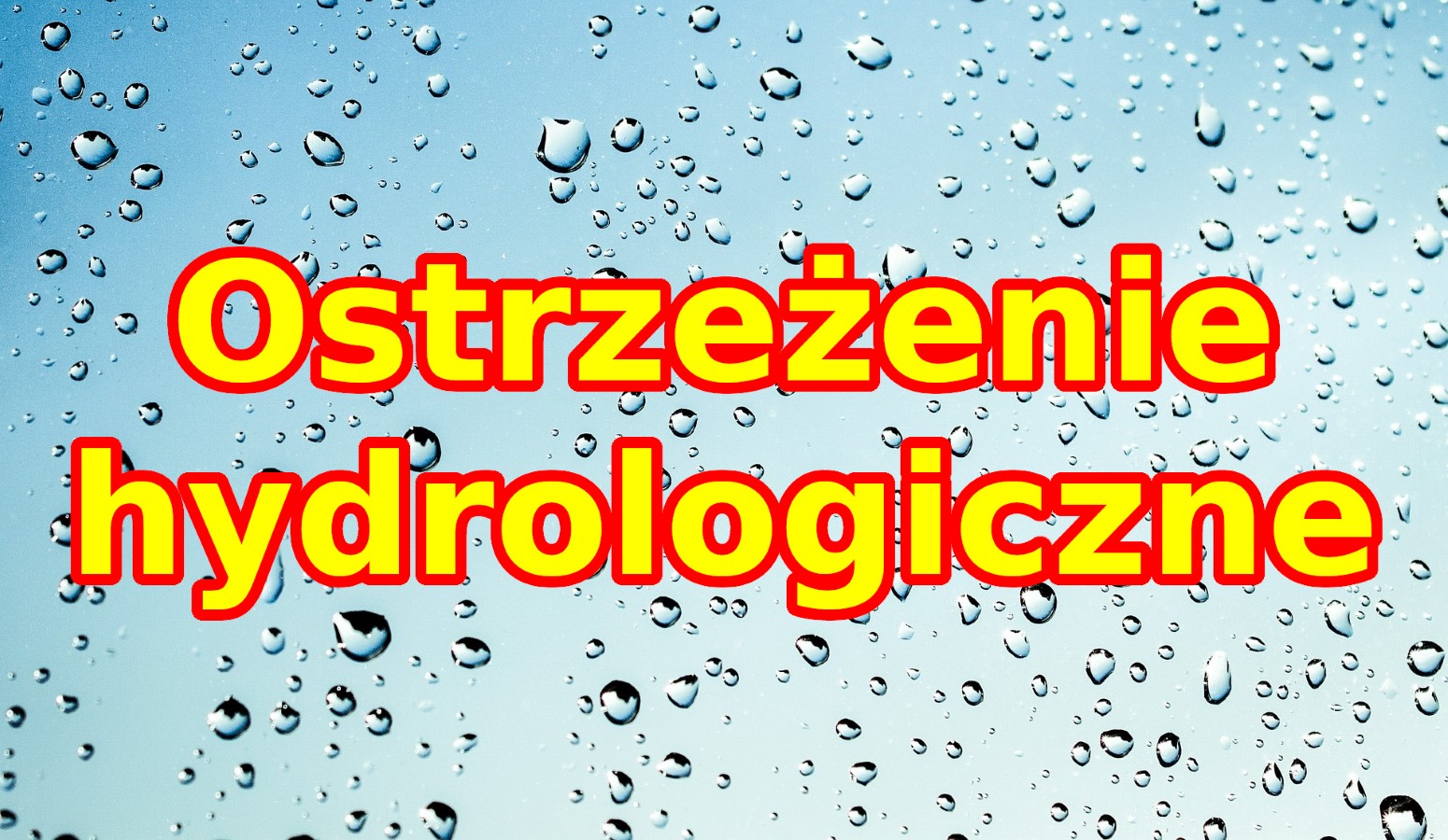 Napis ostrzeżenie hydrologiczne na tle zdjęcia padającego deszczu.